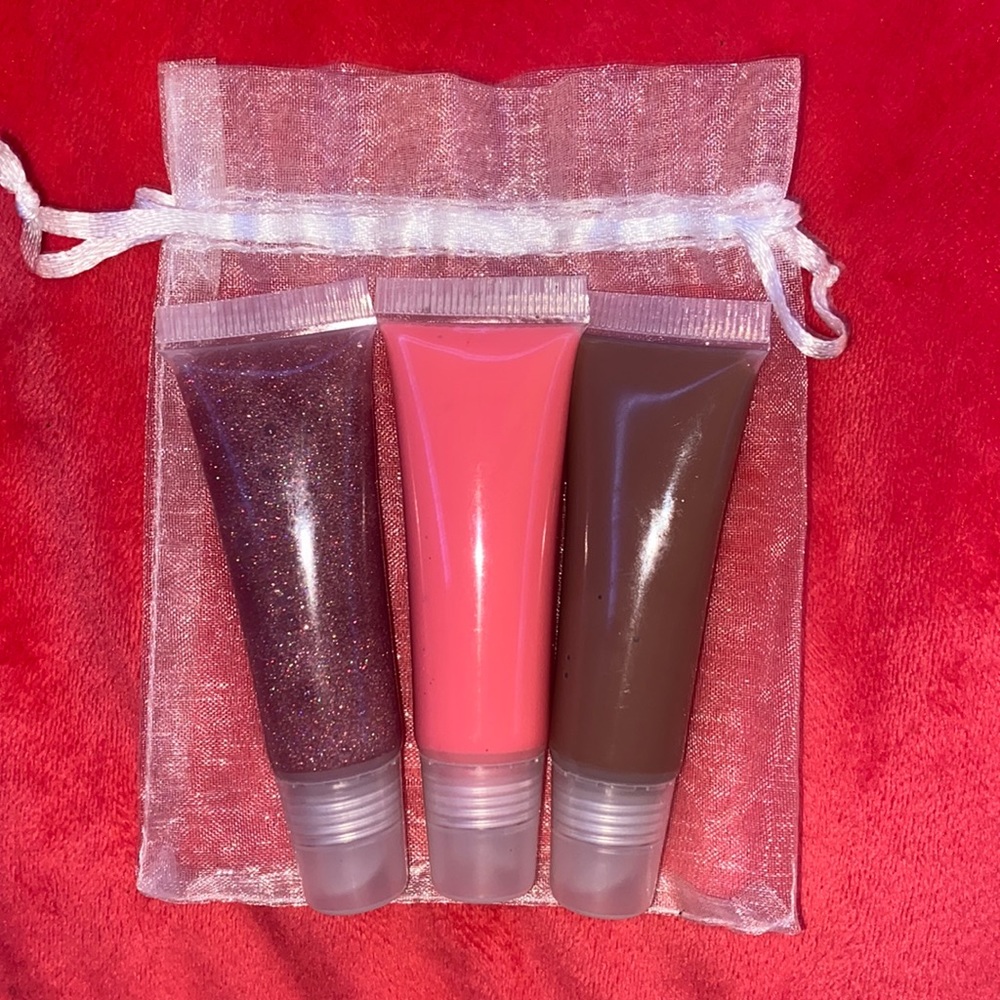 THREE Hydrating Lip Glosses